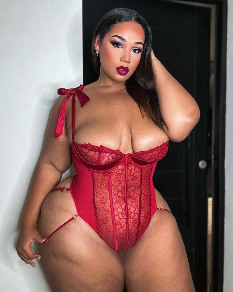 Curvy model strips to lingerie – but fans hit back at trolls for 'fat shaming'